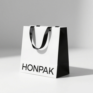 Bolsa de papel de arte ecológica HONPAK, bolsa de compras plana recubierta con estructura resistente y sin línea plegable para ropa y zapatos - Product Image 1