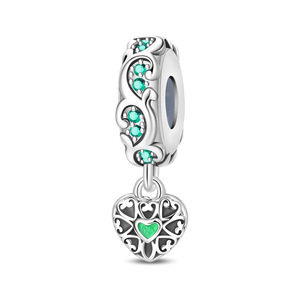 A green and white brass pendant featuring the classic four-leaf clover and heart motif, perfect for women - Product Image 3