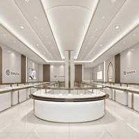 Solution complète d'aménagement de boutique de bijoux moderne et minimaliste : vitrine en verre blanc et or champagne, îlot incurvé