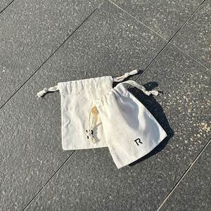 Factory Cheap Custom Printed Cotton <b>Drawstring</b> <b>Pouches</b> Natural Cotton Dust Bag for Gifts Packaging - Product Image 1