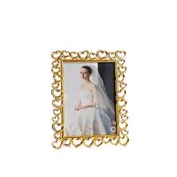 Cadre photo en métal doré à motif floral de style européen, centre de table de mariage, cadre photo en métal fait à la main