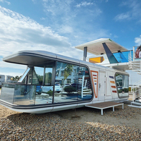 Maison capsule en acier préfabriquée économique à double étage moderne pour usage en villa et hôtel