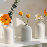 Vases à fleurs en céramique blanche uniques, modernes et décoratifs minimalistes pour la décoration intérieure de la maison