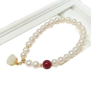 Pulsera de Perlas de Agua Dulce Redondas de Alta Calidad de 6-7 mm, Hilo Elástico con Diseño de Buena Suerte, Impecable y Libre de Núcleos - Product Image 5