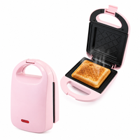 Machine à sandwich électrique compacte rose résistante à la chaleur avec double plaque, poignée verrouillable et voyant lumineux pour la cuisine domestique