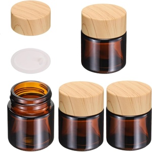 Pot cosmétique de luxe en verre ambré avec couvercle noir, en plastique ambré à grain de bois de bambou, vide, 30g, 50g, 60g, 2oz, pour crème corporelle et beurre corporel - Product Image 1