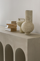 Mobilier minimaliste Wabi-sabi Esthétique Art déco Design arqué ajouré Table d'appoint en béton
