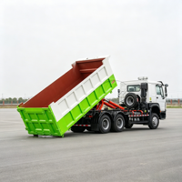 Camion benne à bras de levage Sinotruk Howo 6x4 robuste à double essieu arrière avec benne basculante pour déchets
