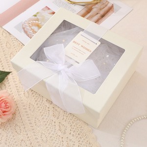 Elegante Caja de Regalo Redonda con Ventana Circular Transparente, Laminación Brillante y Asa de Papel Especial - Product Image 2