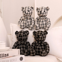 Tout nouveau jouet en peluche à la mode ours en peluche unisexe PP coton rempli cadeau d'anniversaire pour les enfants