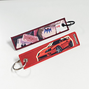 Porte-clés brodés personnalisés en gros pour vêtements et sacs à dos, pendentifs brodés - Product Image 1