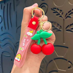 Großhandel 3D PVC Frucht-Schlüsselanhänger Niedliche Avocado Banane Kirsche Erdbeere Taschenanhänger Maßgefertigter Weicher Gummi-Schlüsselring als Geschenk - Product Image 5