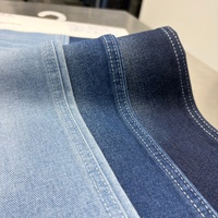 Tissu denim sergé gauche WT7009 10.1oz 179cm de large en coton et fibres recyclées de polyester, vente en gros pour jeans et vêtements