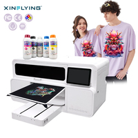 XinFlying Nouveau Imprimante DTG Numérique à Encre Blanche 9 Couleurs pour Vêtement, T-shirt, Logo et Motif, avec Épaisseur d'Impression de 10mm