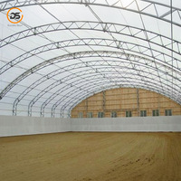 Vente en gros Hangar de bâtiment de structure en acier préfabriqué avec la conception de cadre de botte en acier
