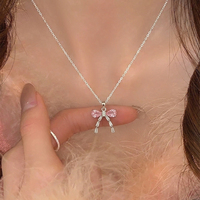 Chaîne de clavicule pour femme avec nœud rose et géométrie, pendentif en forme de cœur, collier de mode exquis et polyvalent