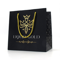 Sac en papier noir en carton pour vêtements, chaussures, emballage de cadeaux de luxe, logo personnalisé recyclable, pour les petites entreprises