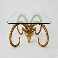 Table basse de luxe italienne en corne de cerf, design moderne et artistique avec plateau en verre, pour salon de villa et décoration de hall d'hôtel
