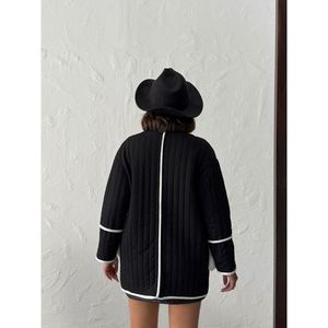 Topshow Women's Black Quilted <b>Suede</b> <b>Jacket</b> with Plush Pocket Details, Elegant Warm Outerwear for Autumn Winter. - Product Image 5