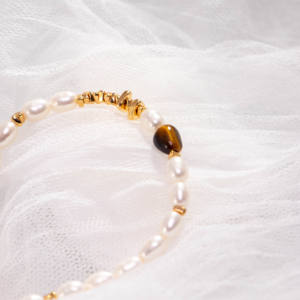 Joyería de Moda Minimalista para Mujer: Delicada Pulsera de Perlas de Arroz con Cadena Ajustable de Piedra Ojo de Tigre en Forma de Bola para Regalos - Product Image 3