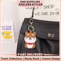 Breloque de sac en cuir motif chien, disponible en OEM et ODM, pour sacs seau, pendentifs de clés de voiture, articles de papeterie mignons pour détaillants, cadeau sur le thème des animaux