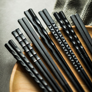 Nuevas palillos de aleación de estilo japonés para uso doméstico, con puntas puntiagudas, negras, de alta calidad, resistentes al moho, al por mayor. - Product Image 1