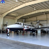 Hangar préfabriqué en acier avec système de porte coulissante, résistance au vent 195 km/h, pour le stationnement d'avions de fret