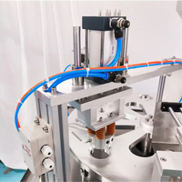 Machine de remplissage, de scellement et d'emballage de gobelets de communion préremplis en acier inoxydable de type rotatif KEFAI pour vin rouge