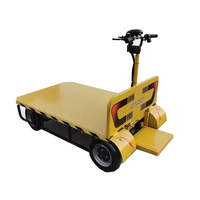 Véhicule de transport à plateau plat à quatre roues, véhicule de transfert électrique pour usine, haute capacité de charge, dimensions personnalisées disponibles.