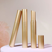 Tube de rouge à lèvres rond de luxe en plastique plaqué or brillant, conteneur de baume à lèvres, emballage cosmétique vide personnalisable en gros