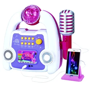 Kids playing and learning toy musical loudspeaker box with microphone HN867499