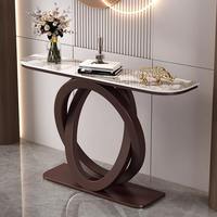 Table console industrielle moderne avec plateau en pierre frittée blanche et base métallique noire à anneaux entrelacés, pour entrée, couloir, table de canapé, maison