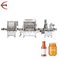 Ligne de production HZPK automatique pour le lavage, le remplissage et le bouchage de bouteilles en plastique et en verre pour sauces, eau, cosmétiques et crèmes