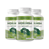 OEM ODM Poudre de feuilles de Moringa verte 100% naturelle pure en capsules, riche en nutriments et en antioxydants