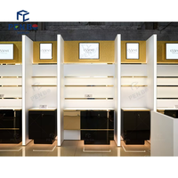 Comptoir et présentoir de parfumerie personnalisés Solutions de décoration intérieure élégantes pour la parfumerie