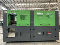 Machine automatique de fabrication de bouteilles, pots et canettes en plastique pour boissons et jus, par soufflage et étirage