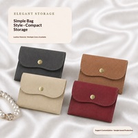 Pochette à bijoux en cuir à bouton-pression, sac de rangement à rabat multicolore pour bagues, colliers et accessoires, pochette créative portable pour pièces de monnaie