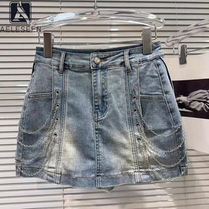 AELESEEN 2025 primavera nueva falda acampanada para mujer falda Casual diseño moda cadena decoración agua caliente gradiente Denim Mini falda - Product Image 1