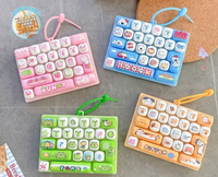 Nouveauté : Clavier mécanique 26 touches, jouet créatif anti-stress à presser au doigt, pendentif de sac portable pour enfants et étudiants
