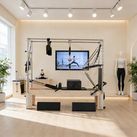 Cama de Pilates Multifuncional de Madera Negra con Sistema Integrado de Reformer y Torre para Entrenamiento de Cuerpo Completo