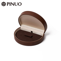 Boîte à bijoux PINUO en cuir marron, boîte à bijoux ronde pour bagues et boucles d'oreilles, fente en velours, logo personnalisé, boîte à bijoux de luxe