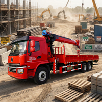 Le fabricant fournit une grue montée sur camion de 12 tonnes avec télécommande sans fil pour levage et transport intégrés