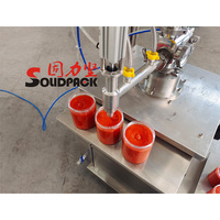 Solidpack machine de remplissage volumétrique à piston vertical semi-automatique pour bouteilles d'huile en pâte liquide avec mélangeur