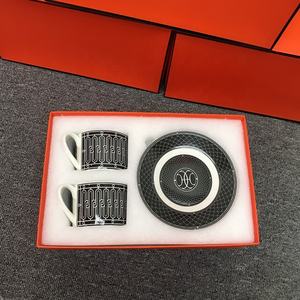 Nuovo Prodotto: Set da Caffè di Lusso in Ceramica Nordica Bianco e Nero con 2 Tazze, Set da Salotto, Tazze da Tè e Piattini in Porcellana - Product Image 1