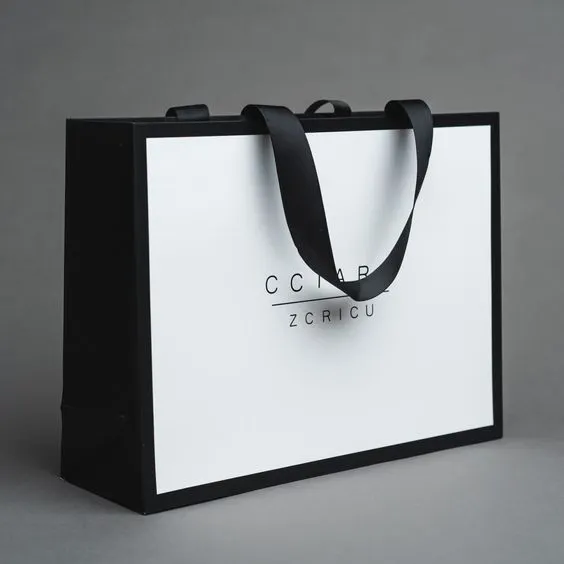 Bolsa de papel para embalagem de roupas, sacola de papel branca personalizada para embalagem de roupas, sacola com alça para roupas