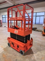Plateforme élévatrice mobile à ciseaux alimentée par batterie, compacte, petite table élévatrice hydraulique pour l'entretien en atelier intérieur