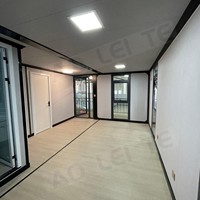 Maison de conteneur pliable extensible à deux étages électrique préinstallée avec escalier intérieur pour villa ou hôtel de luxe