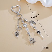 Breloque de sac vintage Y2K avec fermoir cœur, pompon perlé, pendentif étoile, coquillage et flocon de neige, porte-clés pour sac à main femme, cadeau