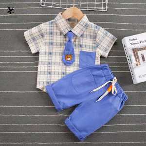 Nuevo Conjunto Deportivo Premium para Niños con Camisa de Solapa y Corbata y Pantalones Cortos de Color Sólido de Proveedor Chino - Product Image 1