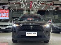 Подержанный внедорожник Toyota Corolla с полным приводом, АКПП, тканевыми сиденьями, шинами R17, панорамным люком, сенсорным экраном, левый руль, 2023 г., бензин, темно-серый